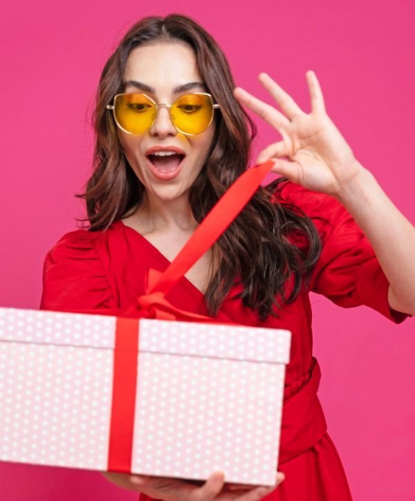 Woman holding a beautifully wrapped gift